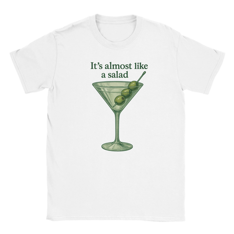 Vit t-shirt med bild på martiniglas med tre oliver och texten "It’s almost like a salad"