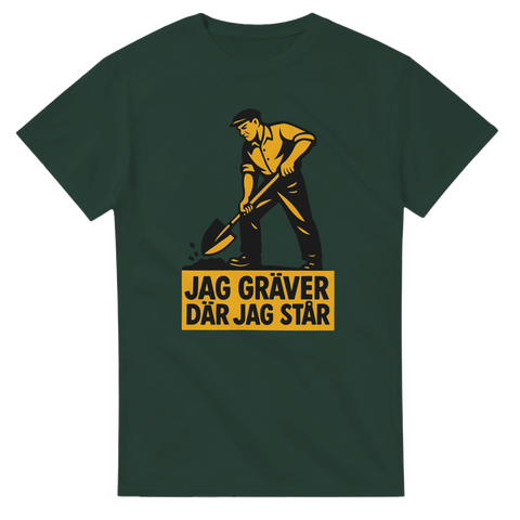 Grön t-shirt med retrotryck av man som gräver och texten Jag gräver där jag står