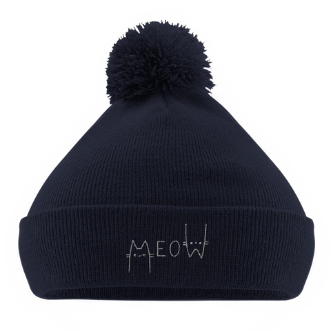 Katter och texten Meow på mössa med tofs.