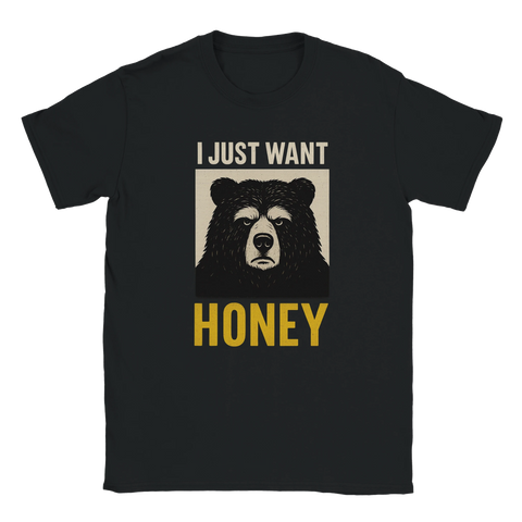 Svart t-shirt med tryck av en svart björn och texten "I just want honey" i vit och gul stiliserad text.