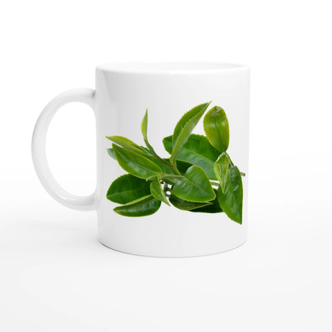 Vit mugg med tryck av gröna teblad i fräsch och minimalistisk design