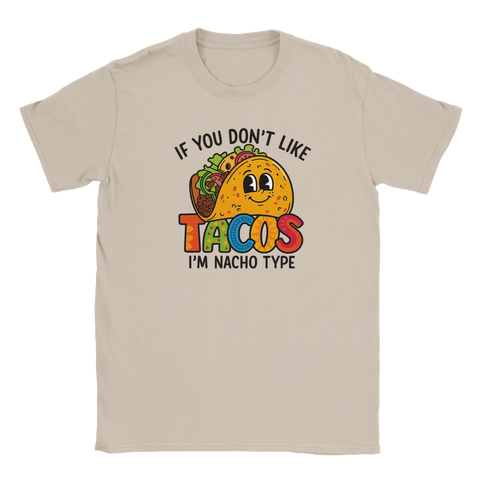 Beige t-shirt med texten “If You Don’t Like Tacos, I’m Nacho Type” och tecknad tacofigur