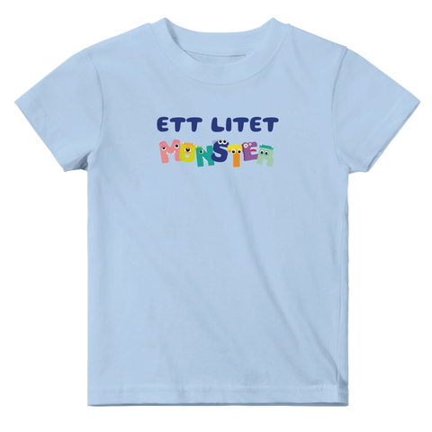 Grafiskt tryck med små monsterfigurer på en ljusblå t-shirt för barn