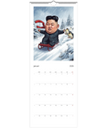 Satirisk King Jong-Un på röd kälke med pingviner i snö, "King Jong-Fun" väggkalender 2026.