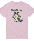 Söt Border Collie tecknad med grönsaker – humoristiskt tryck på rosa t-shirt