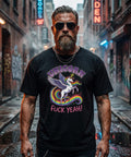 Skäggig man i solglasögon bär en oversized t-shirt med enhörningsmotiv