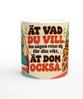 Retro citat-tryck med texten Ät vad du vill på en vit keramikmugg