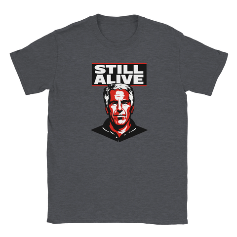 Jeffrey Epstein-porträtt i rött/vitt med text "STILL ALIVE" på mörkgrå t-shirt.