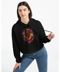 Tecknad svart katt i trolldrycksflaska med texten "Drink at your own risk!" på svart croppad hoodie.