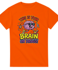 Orange t-shirt med neonfärgat statement-tryck och kaxig cartoon-estetik