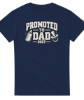 T-shirt med texten Promoted to Dad 2027, napp och nappflaska