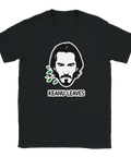 Svart t-shirt med grafiskt ordskämt och stiliserad illustration i vitt och grönt