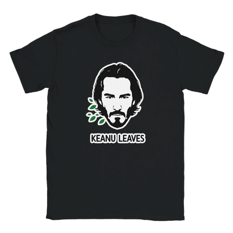 Svart t-shirt med grafiskt ordskämt och stiliserad illustration i vitt och grönt