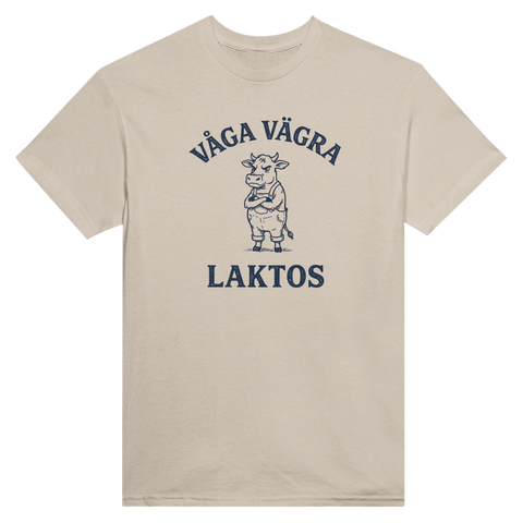 Humoristiskt motiv av ko i snickarbyxor på sandfärgad t-shirt