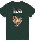 Charles-Ingvar Hönsson med tupp i basker och glasögon på mörkgrön t-shirt.