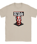 Popkonst-porträtt av Jeffrey Epstein med texten "STILL ALIVE" på beige t-shirt.