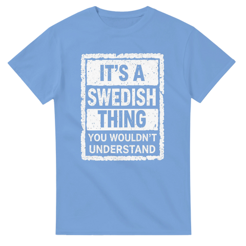 It's a Swedish Thing" text på ljusblå t-shirt med distressed vit rektangulär ram.