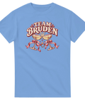 Blå t-shirt med champagneglas, rosett, ring och texten ”Team bruden”.