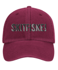 Keps med broderad text skitfiske