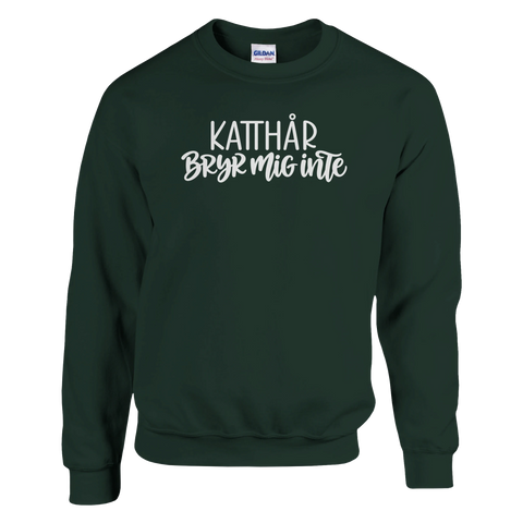 Mörkgrön sweatshirt med texten ”Katthår – bryr mig inte”.