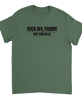 Svart text "F*ck off, Trump. Not for sale" på olivgrön t-shirt.