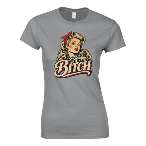 Grafiskt retrotryck med pinuppa och humoristisk text på grå t-shirt för dam