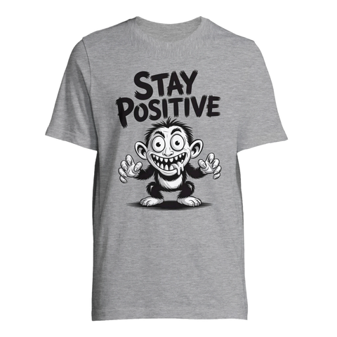Tecknad galen apa med text "STAY POSITIVE" på grå t-shirt.