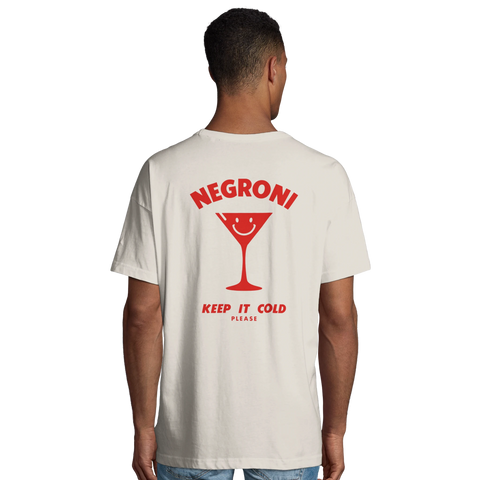 Beige tröja med rött grafiskt tryck av ett leende Negroni-glas