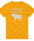 Vitt "Typiskt Schlätta" text och ko-silhuett på gul t-shirt.