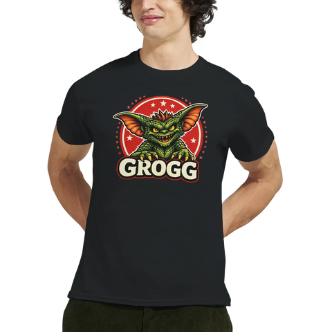 Man bär en svart t-shirt med ett grönt monstertryck och texten Grogg