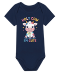Lekfull babybody med färgglad ko-illustration och texten Holy Cow I'm Cute