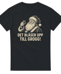 Grafisk t-shirt med humoristiskt julmotiv och texten Det blåser upp till grogg