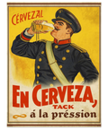 Närbild på en poster med texten En Cerveza, tack á la préssion i rött och brunt tryck på ett halvblankt papper.