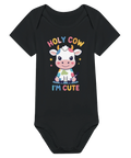 Tecknad färgglad ko med texten "Holy Cow I'm Cute" på svart babybody.