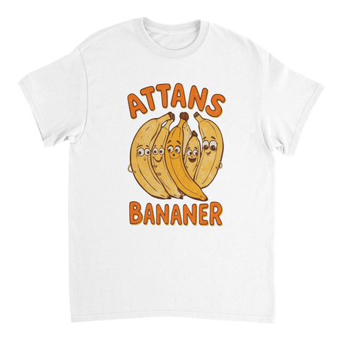 Tecknad illustration av bananer med ansikten och texten Attans Bananer på vit t-shirt