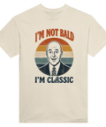 Klassisk cirkeldesign med text om håravfall – rolig t-shirt för män