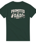T-shirt med texten Promoted to Dad 2027, napp och nappflaska