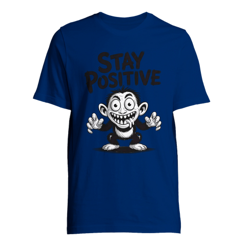 Svartvit galen apa med texten "STAY POSITIVE" på en kungsblå t-shirt i premiumkvalitet.