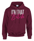 Självsäkert citat i bold vit text på en vinröd hoodie