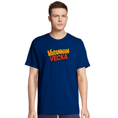 Varannan Vecka" text i pop art-stil på marinblå t-shirt.
