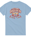Ljusblå t-shirt med champagneglas, rosett, ring och texten ”Team bruden”.