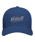 RÖVHATT" broderad text i grått på marinblå trucker keps, satirisk stil.