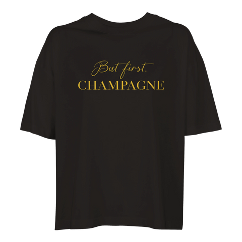 Svart oversized t-shirt med minimalistisk typografi i guld för vardagslyx