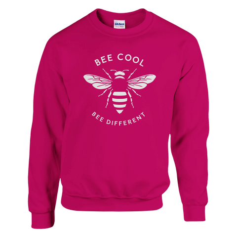 Pink sweatshirt with a bee and a text 'bee cool, bee different'
