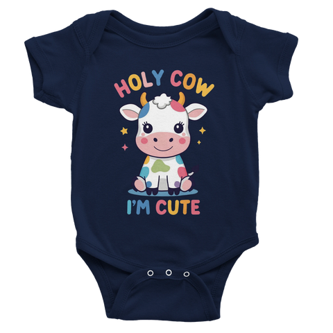 Tecknad färgglad ko, text "Holy Cow I'm Cute", på marinblå babybody.