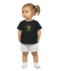 Tecknad grön dinosaurie med kalashatt och ballonger, text "Världens coolaste 1-åring" på svart baby-t-shirt.
