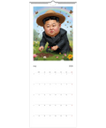 King Jong-Fun karikatyr i stråhatt planterar blomma i en regnbågsäng, Väggkalender 2026.