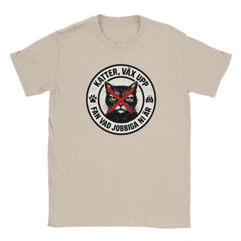 T-shirt med humoristiskt kattmotiv och rött kryss över kattens ansikte