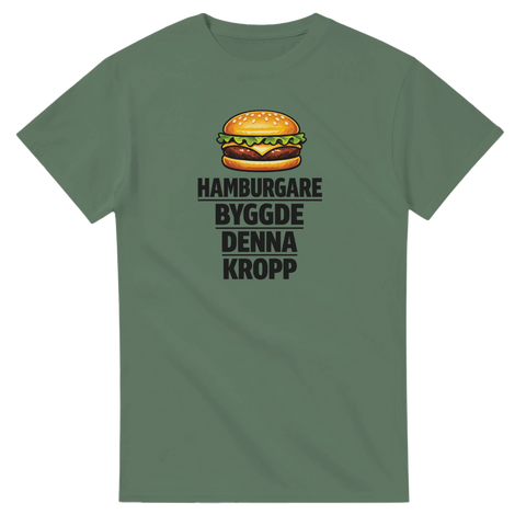 Illustration av en klassisk burgare med text om kroppsbygge på olivgrön t-shirt