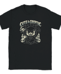 Svart t-shirt med Cute & Cryptic tryck – mörk cartoon-karaktär med dödskallar och ockulta symboler